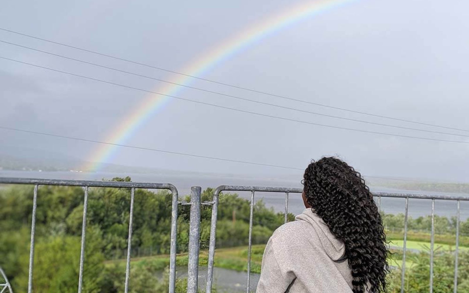 Shylo in Nova Scotia looking at a rainbow