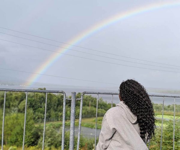 Shylo in Nova Scotia looking at a rainbow